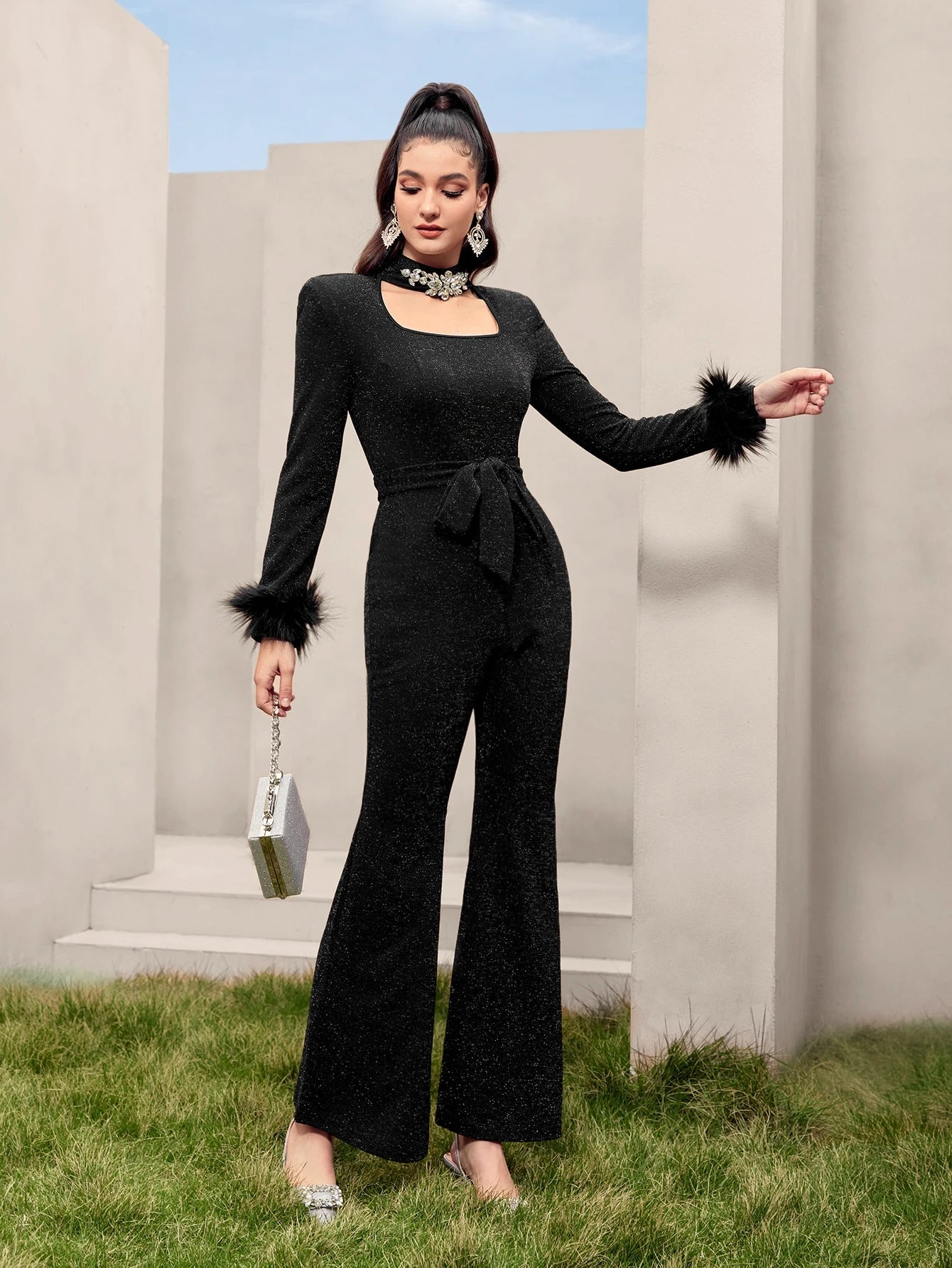 Modelyn Fuzzy Cuff Belted Glitter Flare Leg Jumpsuit