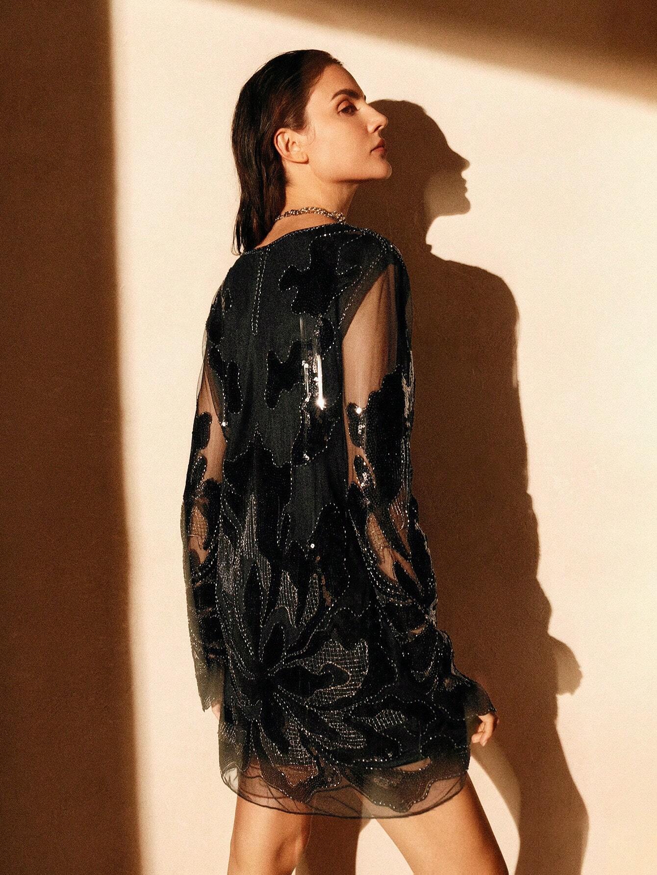 The Anewsta Midnight Beaded Mini Dress