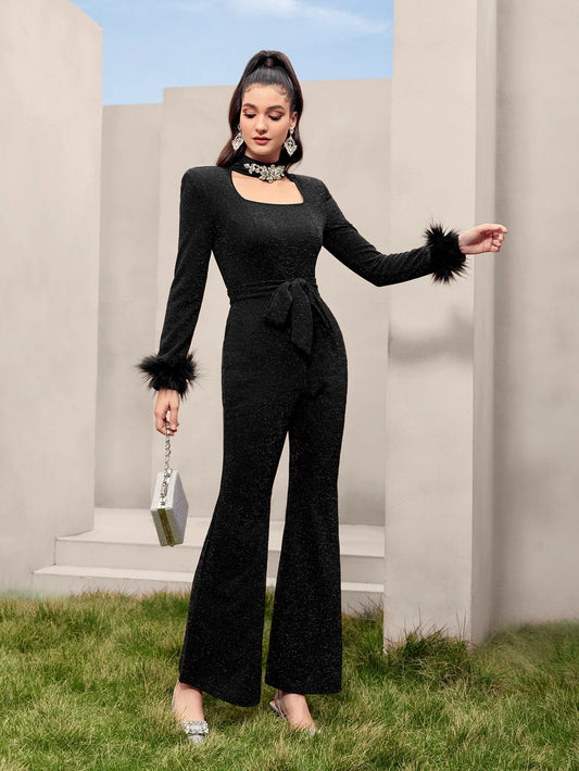 Modelyn Fuzzy Cuff Belted Glitter Flare Leg Jumpsuit