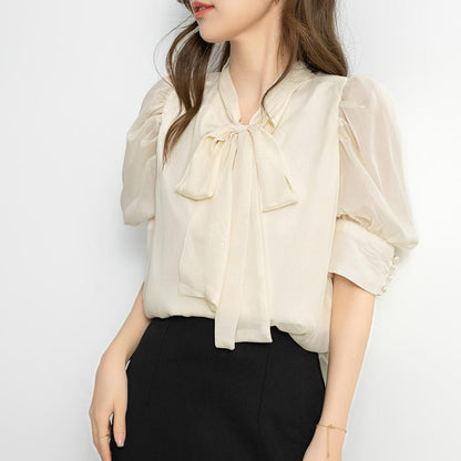 DAZY THE TIE-NECK PEARL PUFF BLOUSE